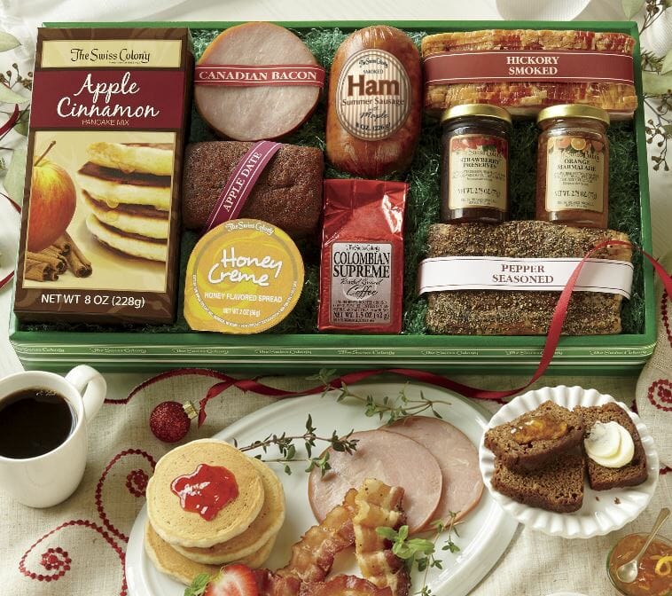 Christmas breakfast gift box with pancake mix, preserves, bacon, ham, bread and ground coffee.