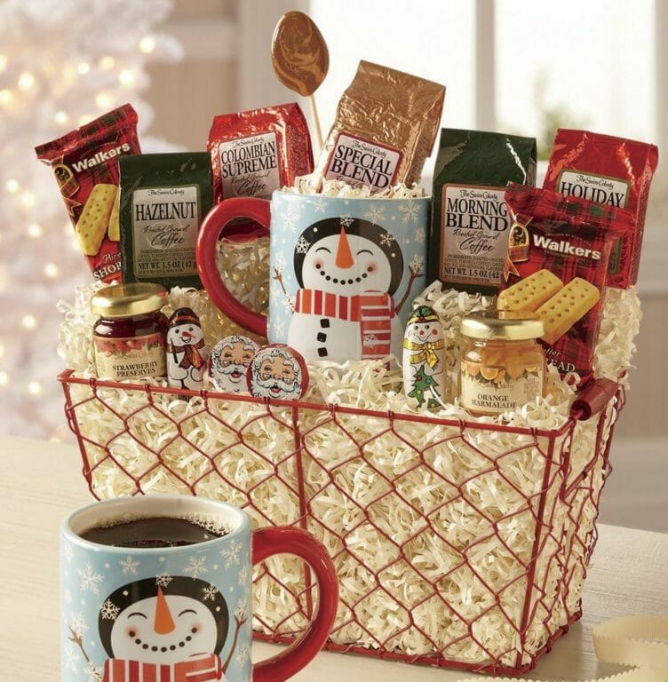 Red wire gift basket filled with a variety of coffee blends, shortbread cookies and a snowman mug.
