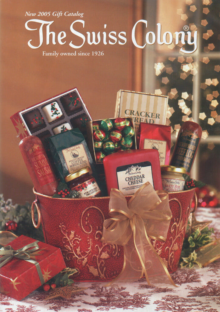 2005 Holiday Swiss Colony Catalog Cover - Red & Gold gift basket with cheese, sausage, and petits fours