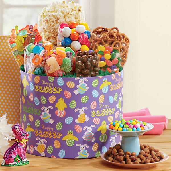 A large Easter-themed container filled with a variety of candies and treats