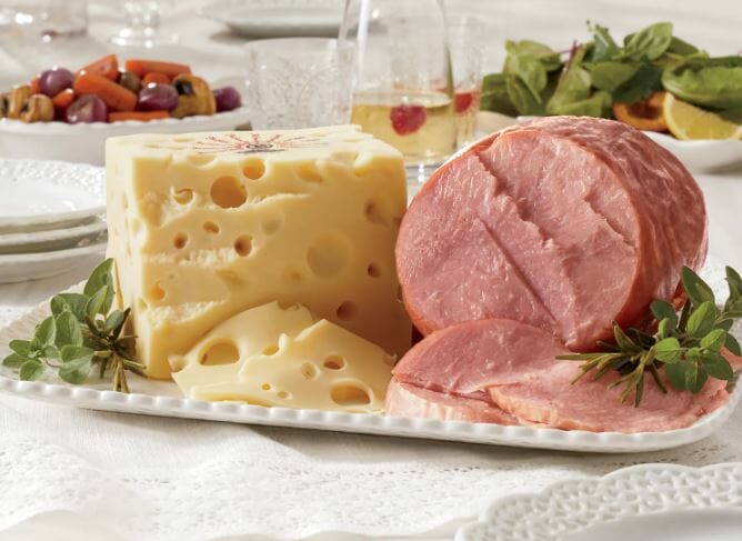 ham and swiss cheese on a white plate